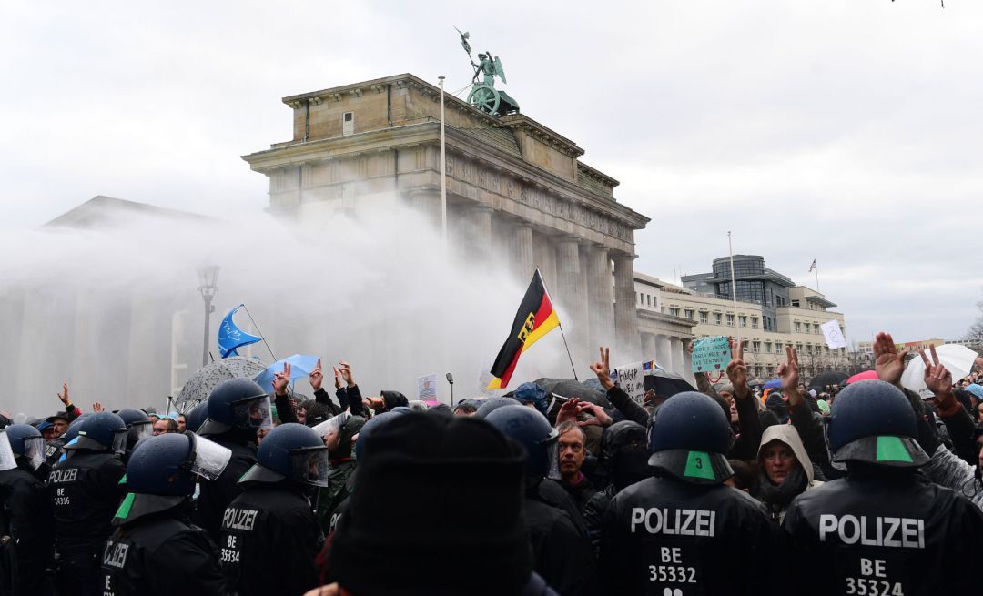 Riot police uses water cannons to break up a demonstration against German coronavirus restrictions Riot police uses water cannons to break up a demonstration against German coronavirus restrictions