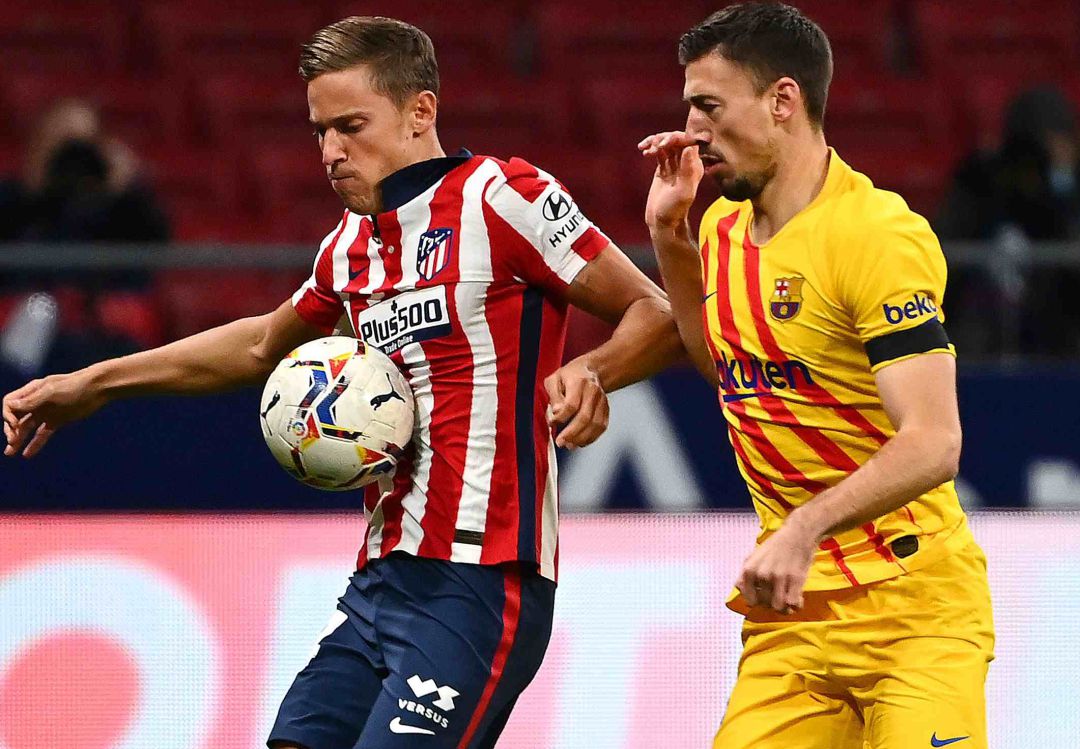 Lenglet defiende una acción de Marcos Llorente durante el Atlético - FC Barcelona (1-0). Lenglet defiende una acción de Marcos Llorente durante el Atlético - FC Barcelona (1-0).