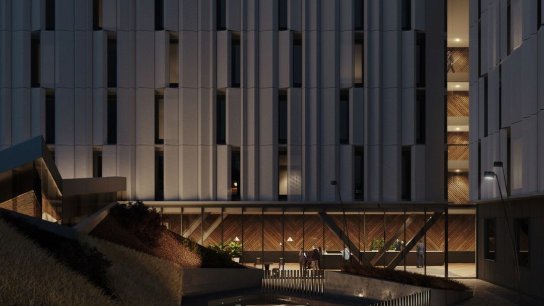 Vista nocturna del hotel Hampton by Hilton Vista nocturna del hotel Hampton by Hilton