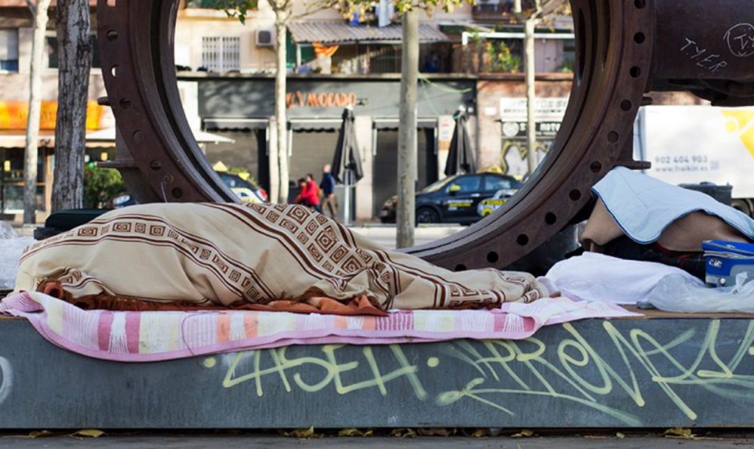 Una persona sense llar a Barcelona Una persona sense llar a Barcelona