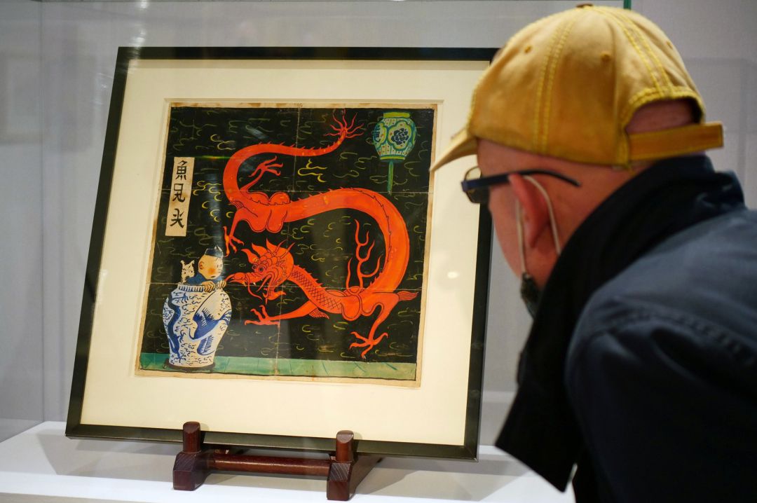 Painting for the original cover of "The Blue Lotus" (Lotus Bleu) Tintin comic book (1936), is displayed before being auctioned by Artcurial in Paris, France January 13, 2021 Painting for the original cover of "The Blue Lotus" (Lotus Bleu) Tintin comic book (1936), is displayed before being auctioned by Artcurial in Paris, France January 13, 2021