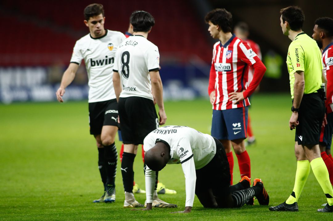 Mouctar Diakhaby of Valencia gets injured during the spanish league, La Liga, football match played between Atletico de Madrid and Valencia CF at Wanda Metropolitano stadium on january 24, 2021, in Madrid, Spain. Mouctar Diakhaby of Valencia gets injured during the spanish league, La Liga, football match played between Atletico de Madrid and Valencia CF at Wanda Metropolitano stadium on january 24, 2021, in Madrid, Spain.
