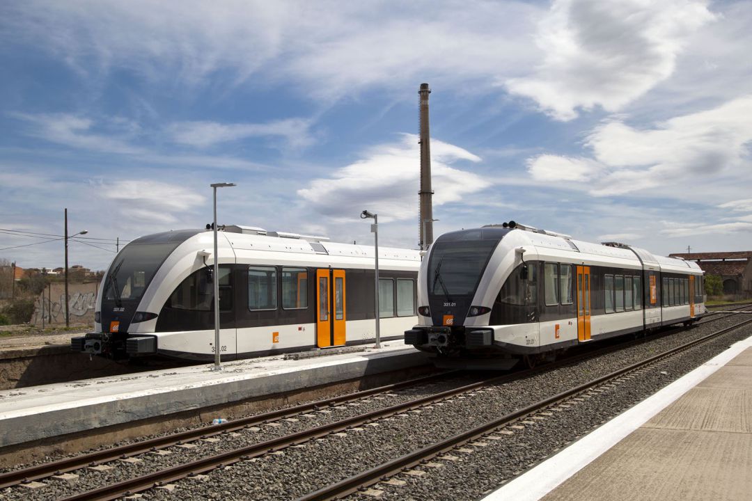 Dos trens dels Ferrocarrils de la Generalitat de Catalunya Dos trens dels Ferrocarrils de la Generalitat de Catalunya