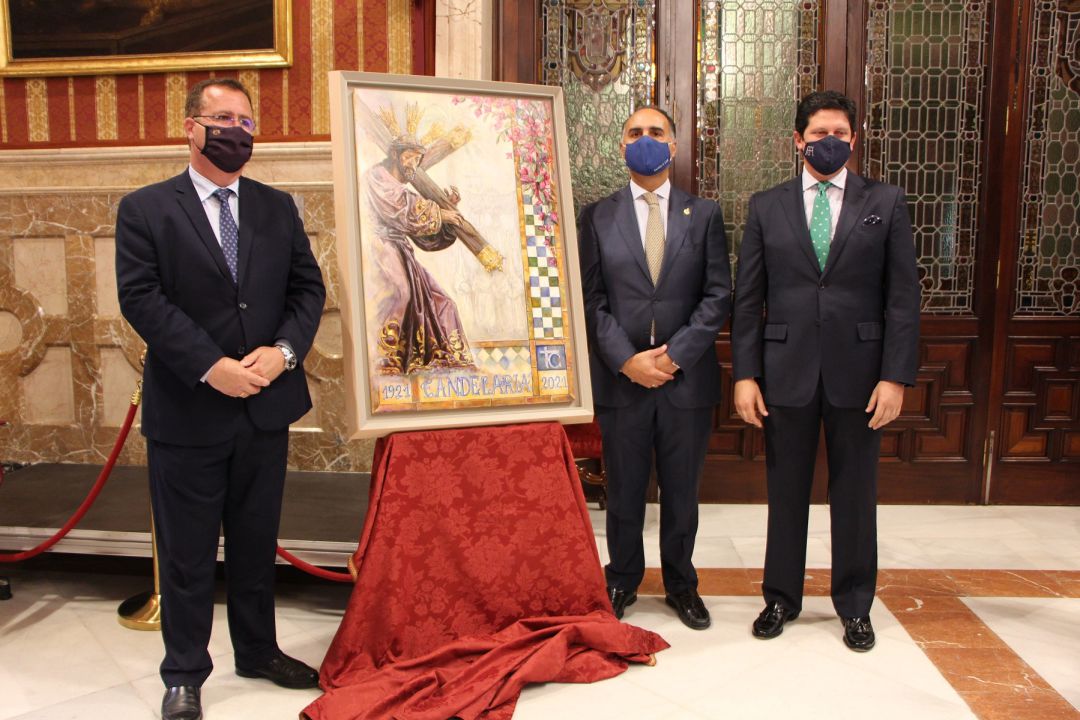 De izquierda a derecha junto al cartel del centenario de La Candelaria, el delegado municipal de Fiestas Mayores, Juan Carlos Cabrera; el hermano mayor Álvaro Delgado y el artista Fernando Aguado De izquierda a derecha junto al cartel del centenario de La Candelaria, el delegado municipal de Fiestas Mayores, Juan Carlos Cabrera; el hermano mayor Álvaro Delgado y el artista Fernando Aguado