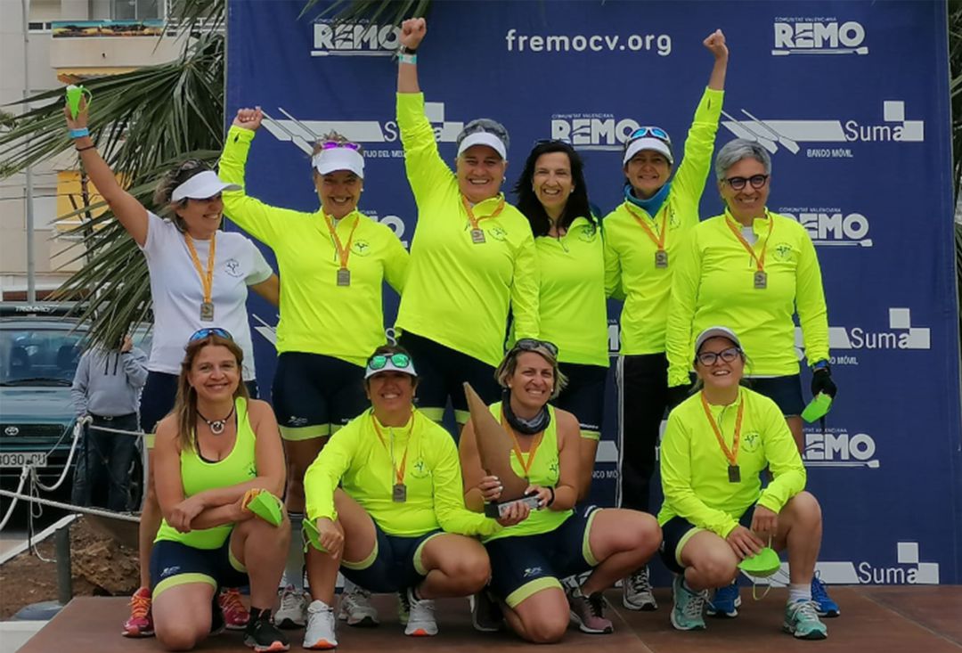 Equipo en el podium. Equipo en el podium.