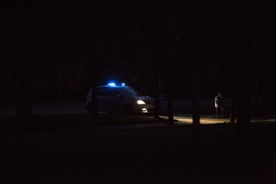 Un coche de la Policía Municipal patrullando por Madrid capital de noche Un coche de la Policía Municipal patrullando por Madrid capital de noche