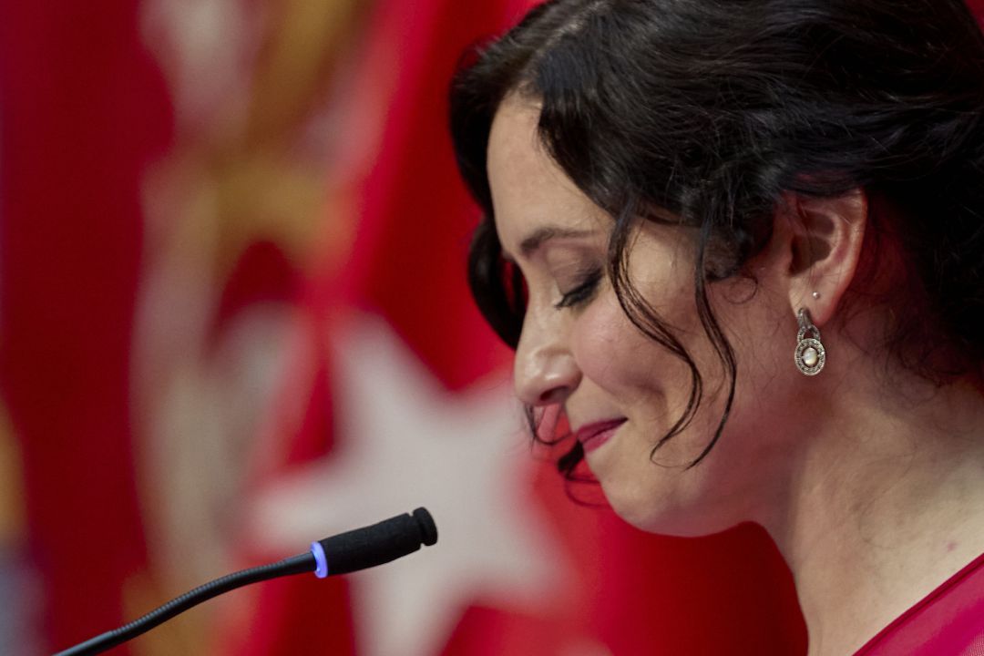 La presidenta de la Comunidad de Madrid, Isabel Díaz Ayuso, en el acto de toma de posesión de los consejeros de su Gobierno este lunes. La presidenta de la Comunidad de Madrid, Isabel Díaz Ayuso, en el acto de toma de posesión de los consejeros de su Gobierno este lunes.
