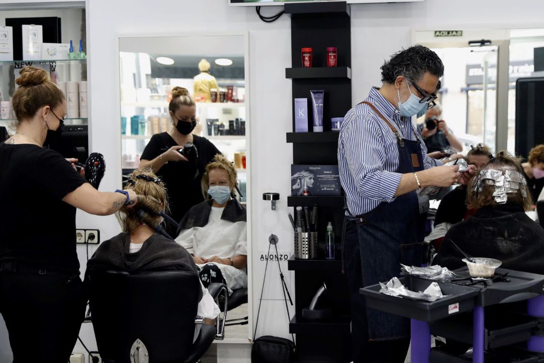 Trabajadores de una peluquería Trabajadores de una peluquería