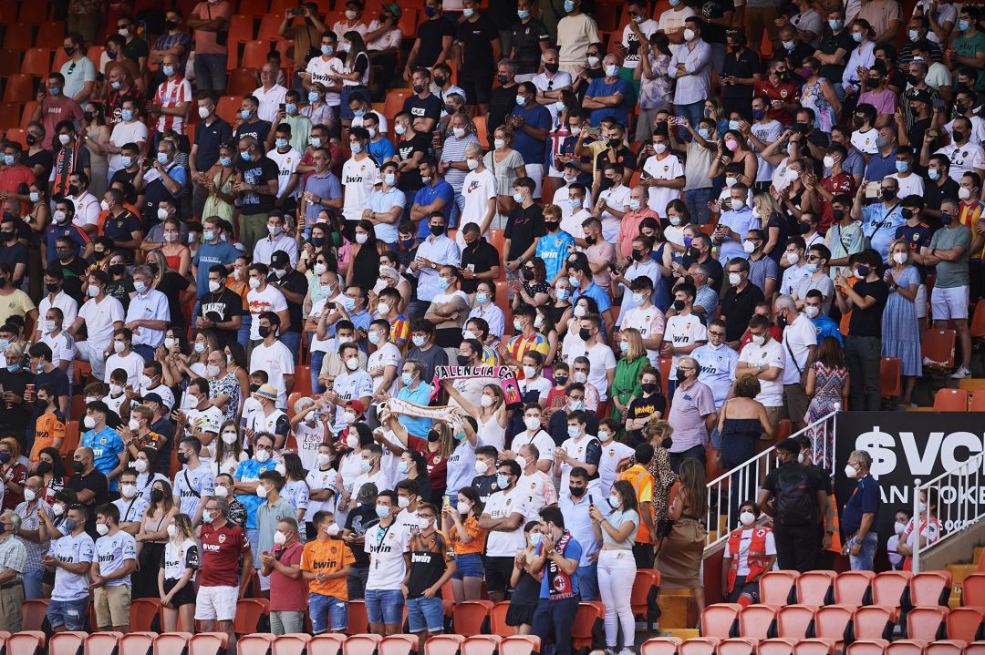 Fans cheer up on their return to the stadium during the pre-season friendly match and Trofeo Taronja between Valencia CF and AC Milan at Estadi de Mestalla Fans cheer up on their return to the stadium during the pre-season friendly match and Trofeo Taronja between Valencia CF and AC Milan at Estadi de Mestalla
