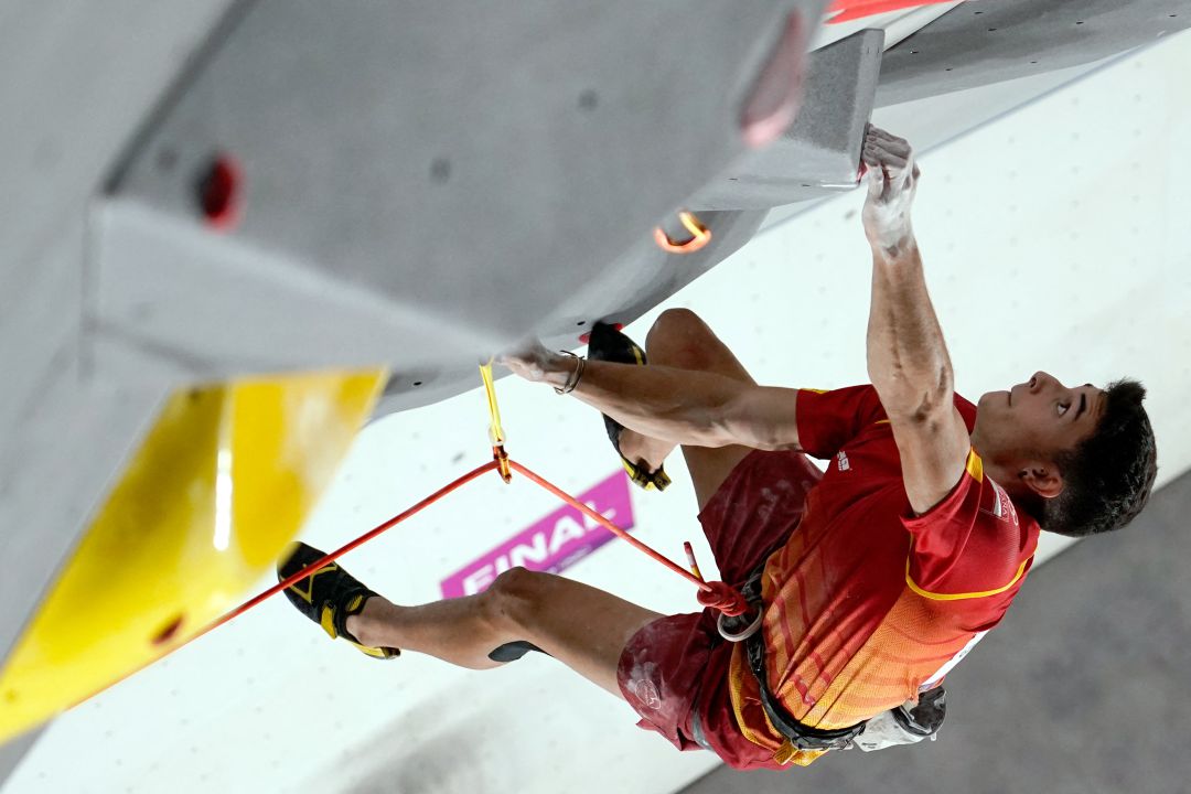 In this overview image gold medallist Spain's Alberto Gines Lopez competes in the men's sport climbing lead final during the Tokyo 2020 Olympic Games at the Aomi Urban Sports Park in Tokyo on August 5, 2021 In this overview image gold medallist Spain's Alberto Gines Lopez competes in the men's sport climbing lead final during the Tokyo 2020 Olympic Games at the Aomi Urban Sports Park in Tokyo on August 5, 2021