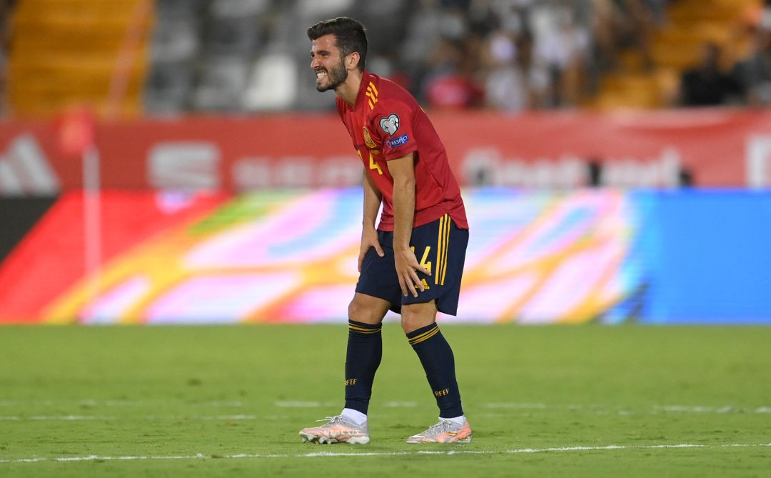José Gayà of Spain holds his leg with an injury during the 2022 FIFA World Cup Qualifier match between José Gayà of Spain holds his leg with an injury during the 2022 FIFA World Cup Qualifier match between