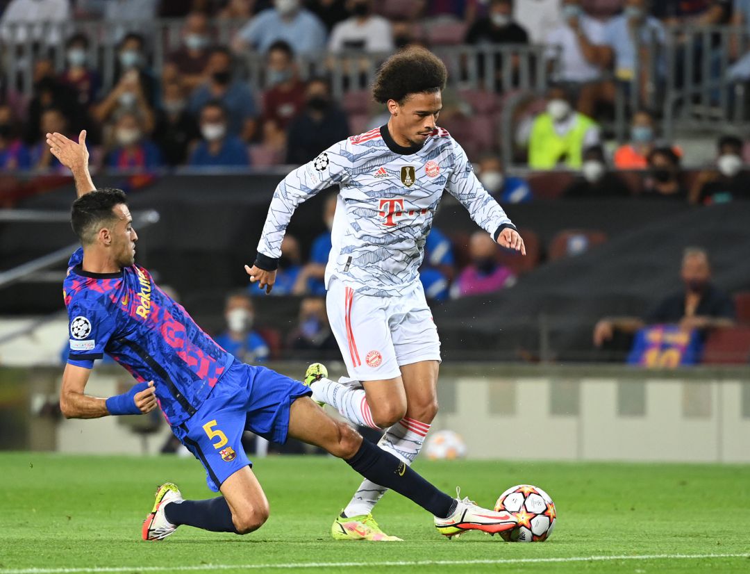 Leroy Sane y Sergio Busquets, en una acción del partido. Leroy Sane y Sergio Busquets, en una acción del partido.