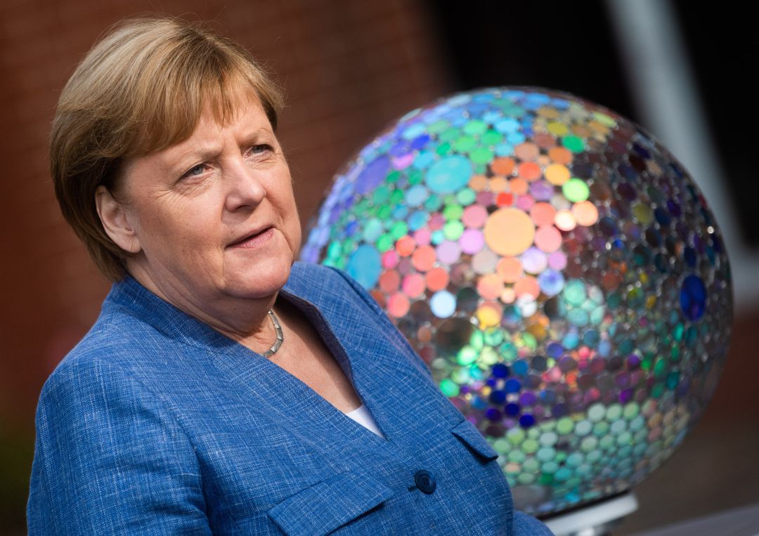 La canciller saliente, Angela Merkel, durante la visita a una empresa tecnológica el pasado 17 de septiembre. La canciller saliente, Angela Merkel, durante la visita a una empresa tecnológica el pasado 17 de septiembre.