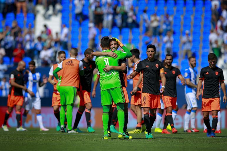 LEGATES, SPAIN - SEPTEMBER 25: Goalkeeper Diego Alves (L) of Valencia CF celebrates their victory with teammate Dani Parejo (R) after the La Liga match between CD Leganes and Valencia CF at Estadio Municipal de Butarque on September 25, 2016 in Leganes, Spain. (Photo by Gonzalo Arroyo MorenoGetty Images)