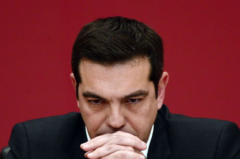 The leader of the leftist Syriza party, Alexis Tsipras, listens to a question during a televised press conference on January 23, 2015 at the Zappion Hall in Athens. Greeks vote on January 25 in a general election for the second time in three years, with radical leftists Syriza leading the polls with a promise to renegotiate the international bailout that has imposed five years of austerity on the country.   AFP PHOTO/LOUISA GOULIAMAKI