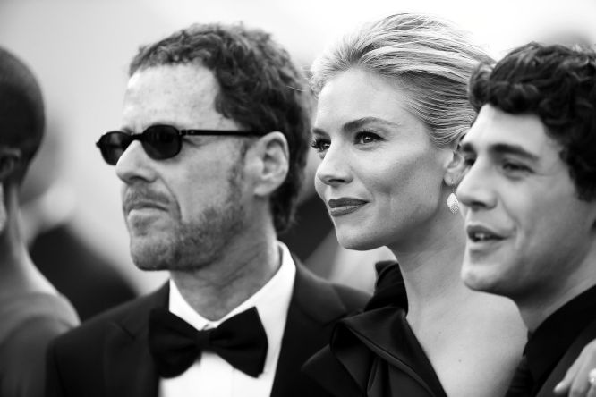 CANNES, FRANCE - MAY 13: (EDITORS NOTE: Image has been digitally manipulated) Ethan Coen, Xavier Dolan and Sienna Miller attend the opening ceremony and premiere of "La Tete Haute ("Standing Tall") during the 68th annual Cannes Film Festival on May 13, 2015 in Cannes, France. (Photo by Mike Marsland/WireImage)