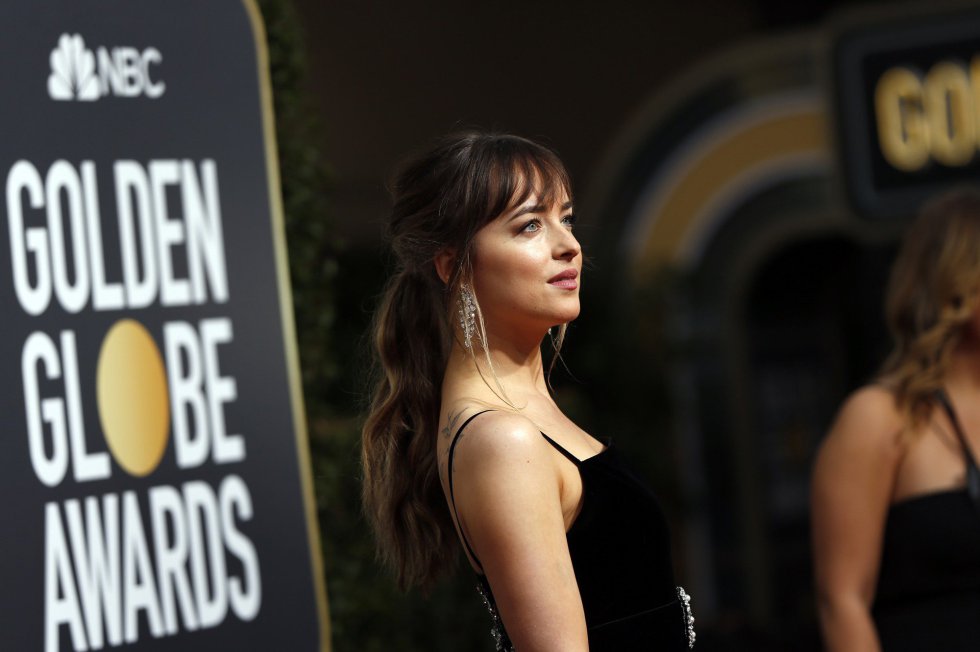 Dakota Johnson a su llegada a la alfombra roja Dakota Johnson a su llegada a la alfombra roja