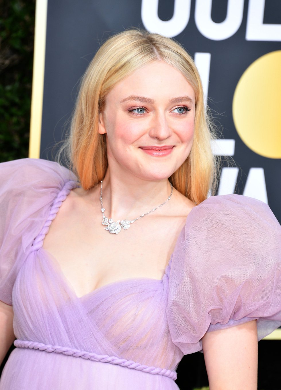 La actriz Dakota Fanning, en la gala de los Globos de Oro, celebrada este domingo en Beverly Hills, California (EEUU). La actriz Dakota Fanning, en la gala de los Globos de Oro, celebrada este domingo en Beverly Hills, California (EEUU).