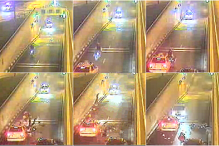(Imagen1) Los motoristas salen del tunel de O'Donell en dirección contraria, mientras dos unidades de la policía les persigue, una por el propio túnel y otra por la vía superior