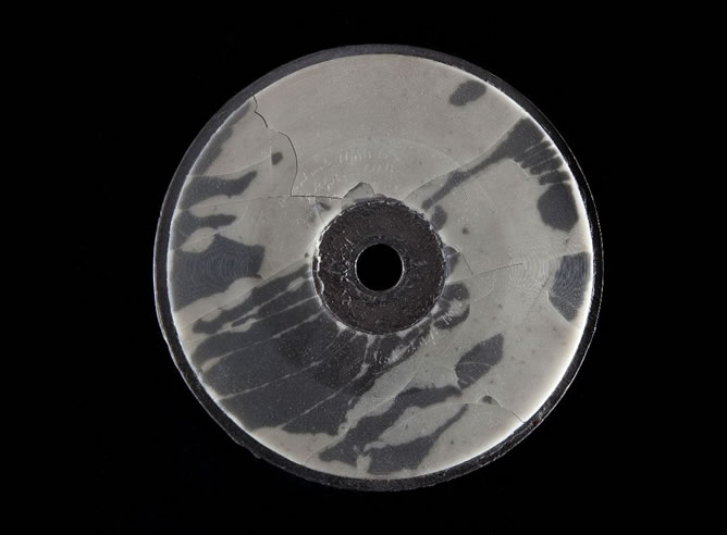 Disco de cartón cubierto por parafina en el que se encontraba la grabación de Graham Bell