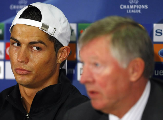 Cristiano Ronaldo y Ferguson, durante una rueda de prensa