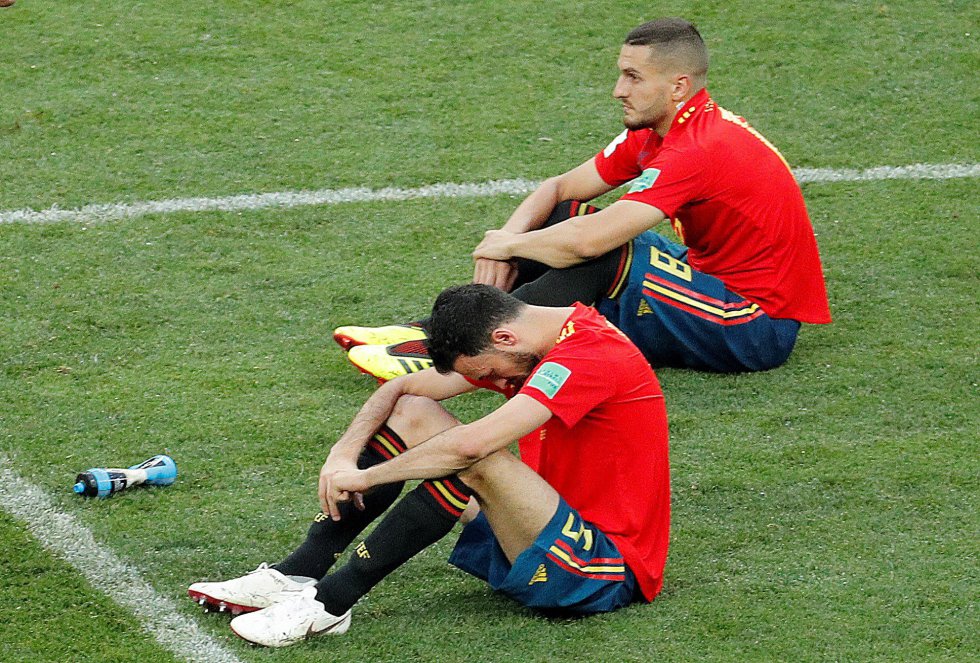 Busquets y Koke, cabizbajos Busquets y Koke, cabizbajos