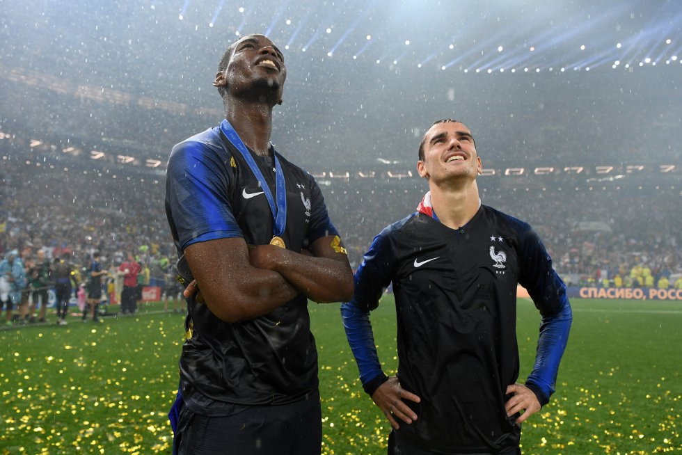 Paul Pogba y Antoine Griezmann durante la celebración. 