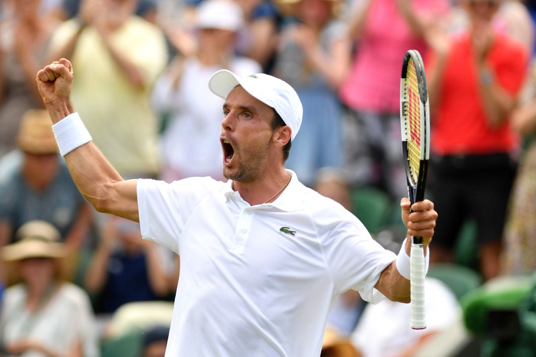 Roberto Bautista celebra un triunfo en Wimbledon.