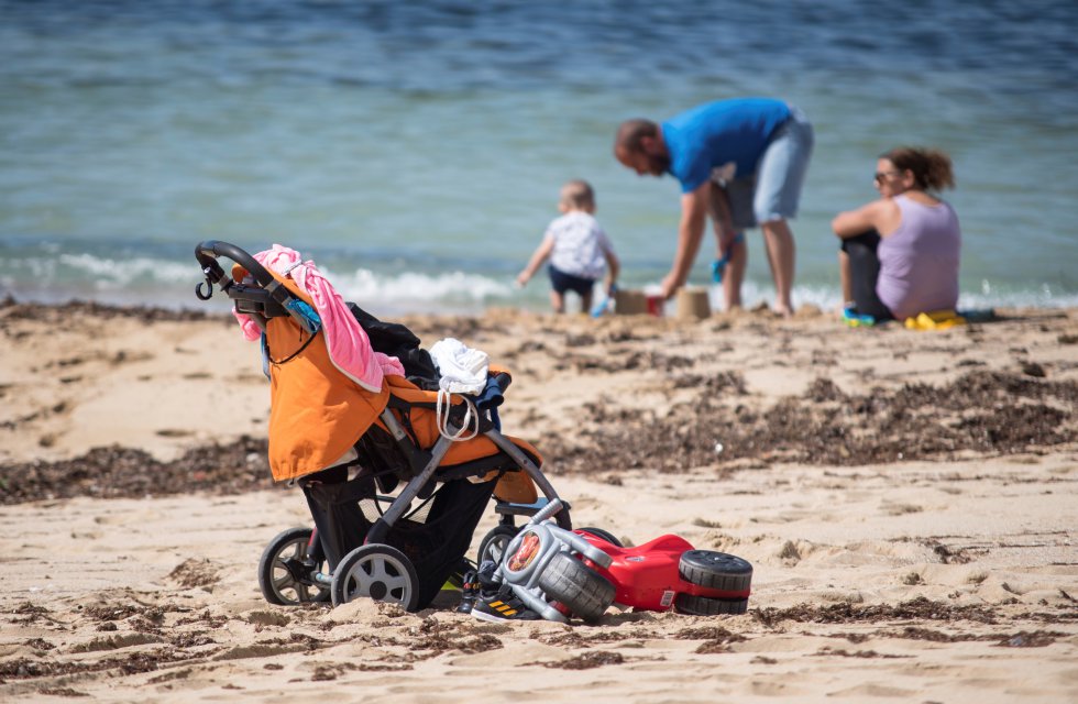 Una familia en la playa en Palma Una familia en la playa en Palma